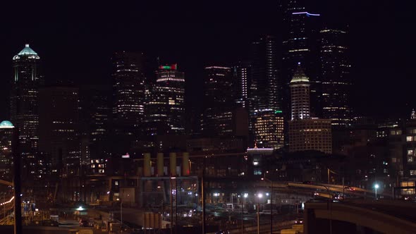 Seattle SODO Neighborhood Night Buildings Illuminated Futuristic Hyper Lapse alt