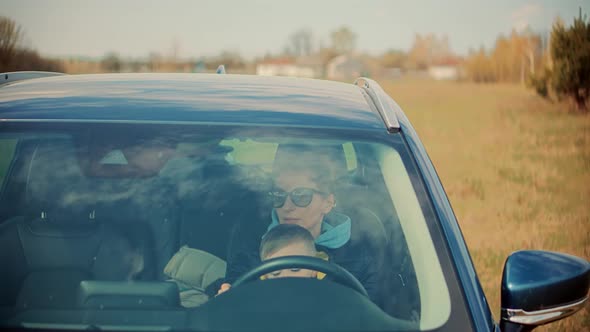 Happy Family Mother And Child Boy Leisure. Son Boy Vacation Happiness. Cute Little Kid Having Fun. alt