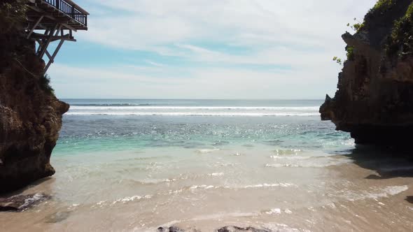 Drone Fly Out From Cave to Ocean alt
