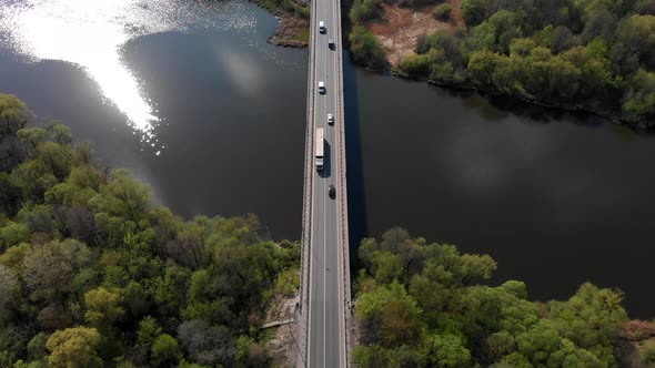 Transport and Cars Go Along the Highway. Roads Bridges and Traffic Jams. Logistics Enterprises.