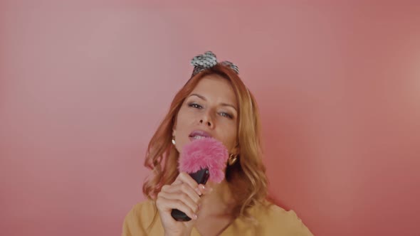 Portrait of a Pretty Young Blonde Woman in Retro Style alt