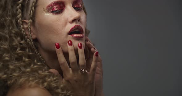 Model Is Posing and Touching Her Face, Jewelry Commercial, Portrait,  alt