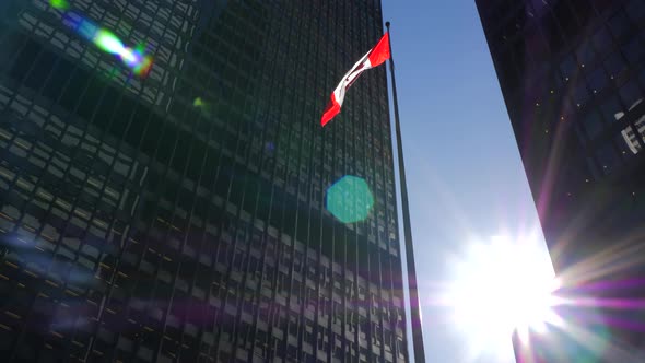 Tower With Tall Downtown Office Buildings On Sunny Day With Canadian Flag