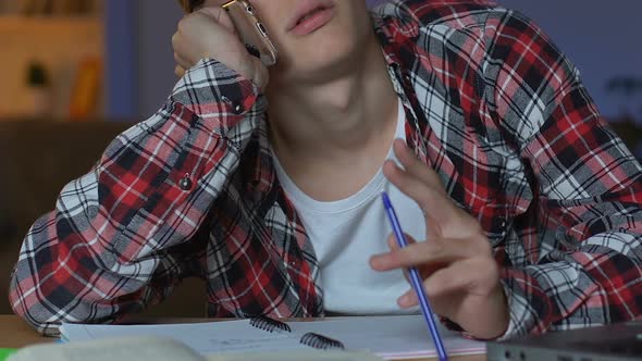 School Pupil Talking Phone While Doing Homework, Feeling Bored, Studying Break alt
