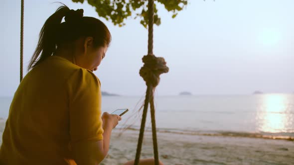 asian female traveller wear casual cloth dress enjoy vacation sunset moment alt