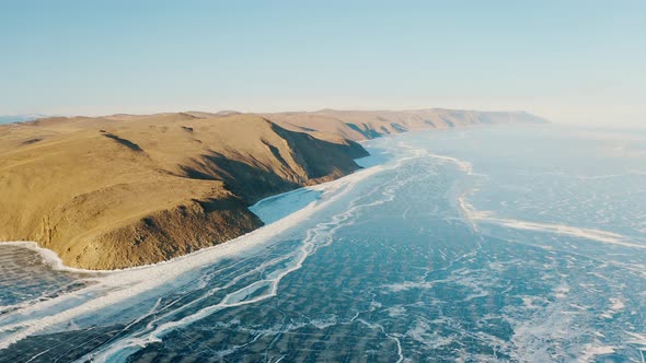 Baikal lake Olkhon island Mountains Cliffs Sunrise Ice Snow Winter Baikal Irkutsk Siberia Russia alt
