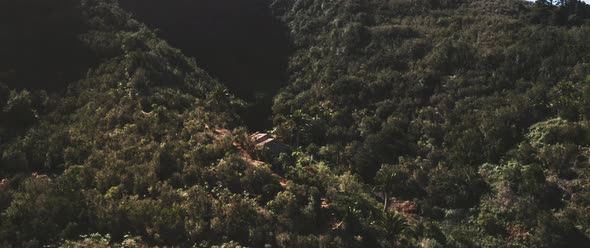 Ruins of a house being shown in the surroundings alt