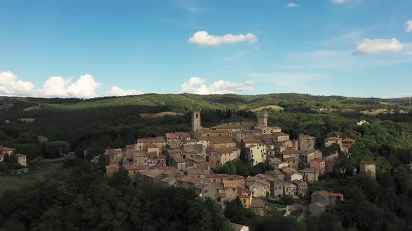 Aerial, A Beautiful View On A Little Medieval Town In Tuscany, Italy On A Sunny Day