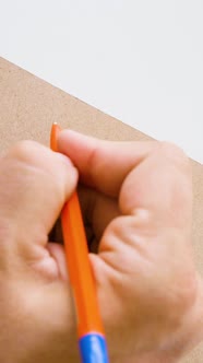 Man's Hand Starting Write a Letter alt