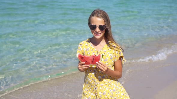 Happy Child on the Sea with Watermelon