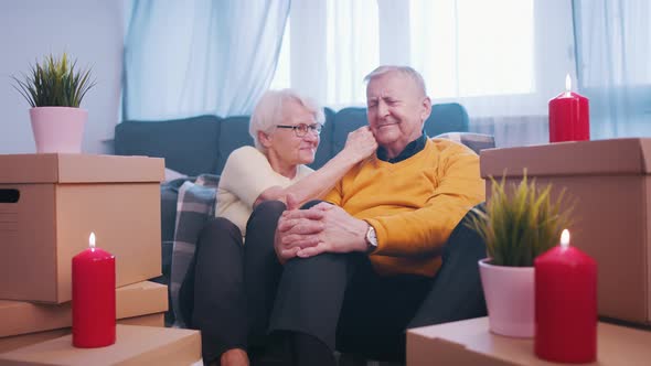 Happy Retired Couple Enjoying Valentines Day with Candle Lights alt