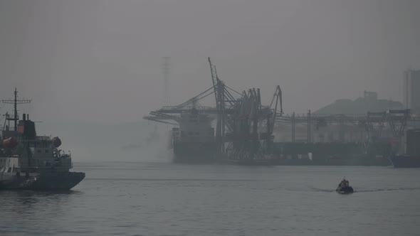 Port in the Fog the Tug Is Coming