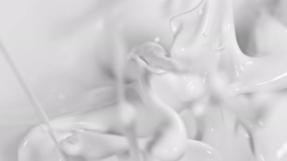 Super Slow Motion Shot of Splashing Cream at 1000Fps alt