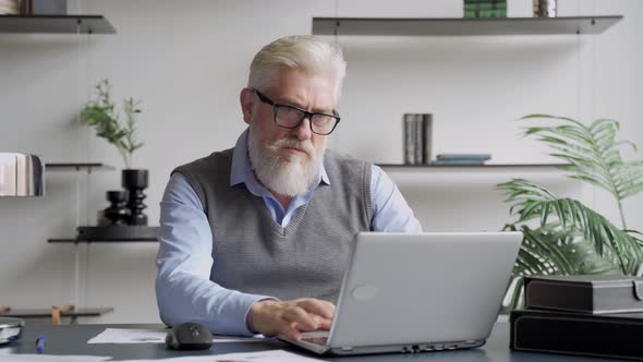 Tired Elderly Man Sit at Desk Take Off Glasses Rest From Laptop Reduces Eyestrain After Long Modern alt