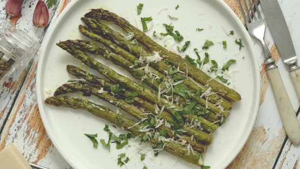 Roasted Asparagus with Parmesan Cheese and Parsley. Healthy Spring Food Concept. View From Above. alt