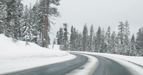 Driving on mountain road in winter