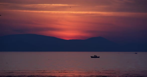 Fishermen On The Sea Sunset alt