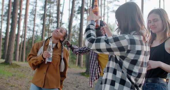 Camping Party with Dancing and Chilling People with Beer Bottles  60p Prores