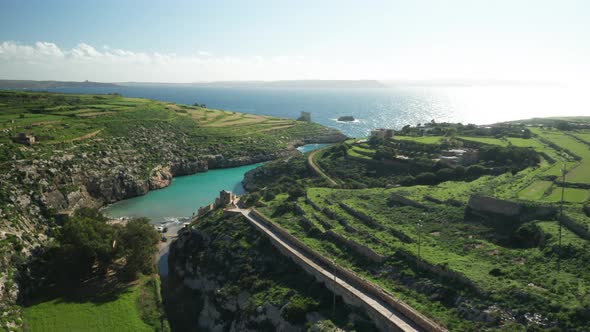 AERIAL: Road Leading to Magrr Ix-Xini Bay in Mediterranean Sea