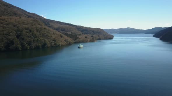 Commuter Boat Travelling Across Lake Ashi in Japan alt