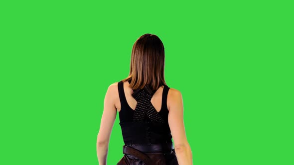 Anime Character Girl Walks and Gets the Gun Out of Holster on a Green Screen Chroma Key