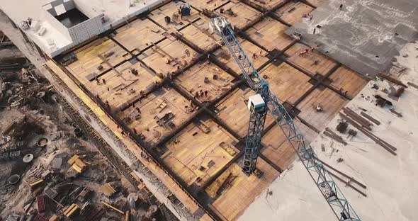 Flight Over the Construction Plant of the Shopping Center with Crane and Scaffolding