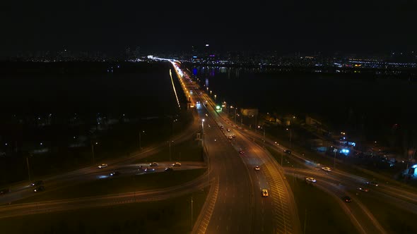 Transport Interchange Near Paton Bridge, Kyiv, Ukraine. Night Traffic Aerial View alt