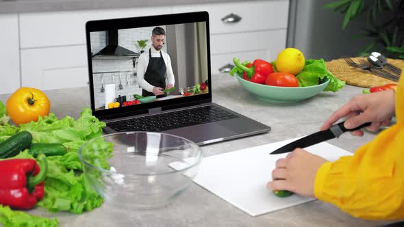 Man Food Blogger in Computer Screen Tells Teaches Housewife Online Video Call alt
