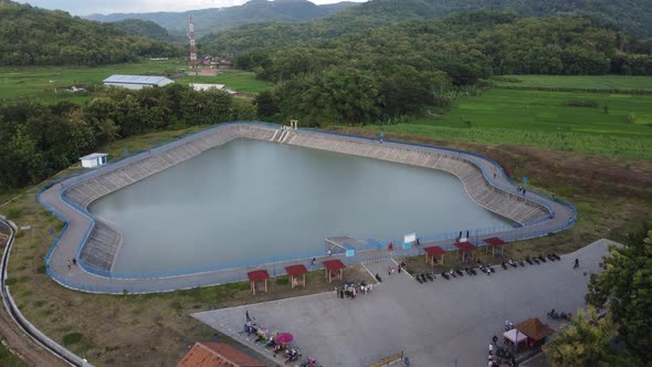 Aerial view of a pond with a puppet-like shape in the Bantul area, Yogyakarta alt