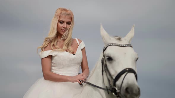 Amazing Beautiful Bride Dressed White Gorgeous Dress is Riding Horse Portrait of Romantic Lady alt