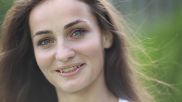 Beautiful Caucasian Woman Smiling at Camera.