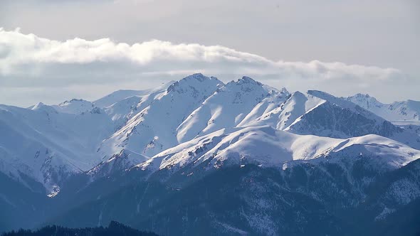 8K Snowy Mount Olympus Mountain Range in Winter