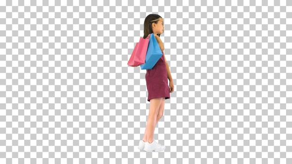 Pretty asian girl with colorful shopping bags, Alpha Channel alt