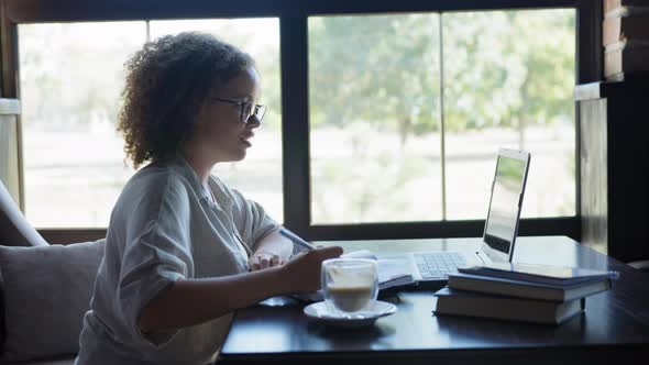 Online Communication, Young Woman Undergoes Remote Training Using Video Connection on Computer in
