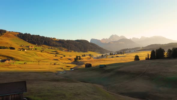 Autumn Morning and Bright Misty Sunrise in the Valley of Compaccio. Province of Bolzano, Italian Alps