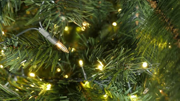 Close-up of  LED sparkling decoration  on the artificial tree  4K 2160p 30fps UltraHD footage - Sequ alt