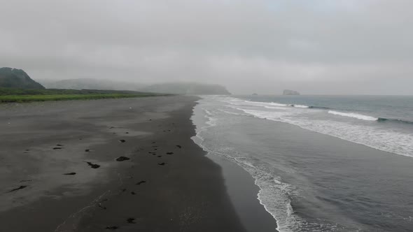 Aerial Top View of Khalaktyrsky Beach with Black Sand on Kamchatka Peninsula alt