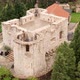 Old stone fortress Besac in Virpazar Montenegro. Aerial view of medieval castle on top of the hill - VideoHive Item for Sale