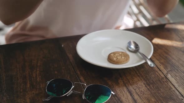 Woman Drinking Cappuccino at Cafe Outdoors Excellent Coffee alt