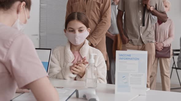 People Using Hand Sanitizer in Hospital alt