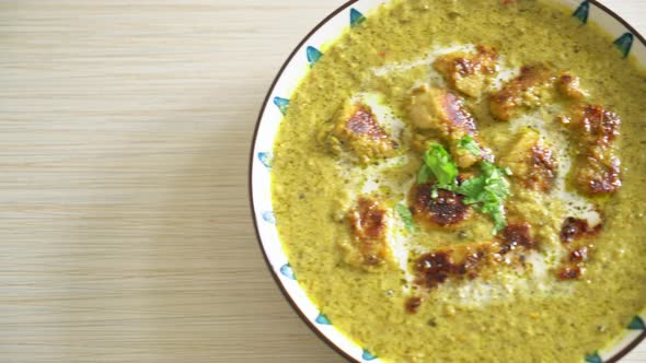 Afghani chicken in green curry or Hariyali tikka chicken hara masala - Indian food style alt