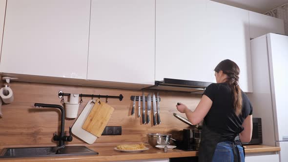 Woman Preparing Pancakes Man Crept Up and Stole Slow Motion alt