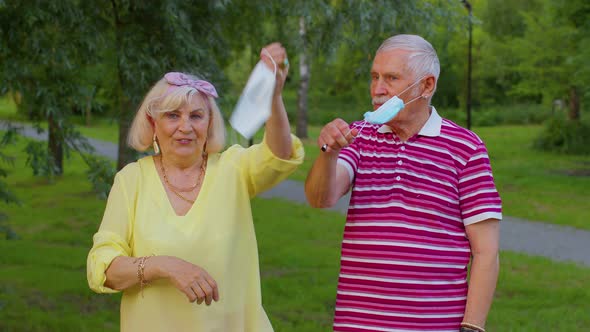 Quarantine Coronavirus is Over Senior Old Family Grandparents Take Off Medical Masks Celebrate alt