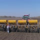 Farmer in the Field Checks and Repairs the Seeder - VideoHive Item for Sale