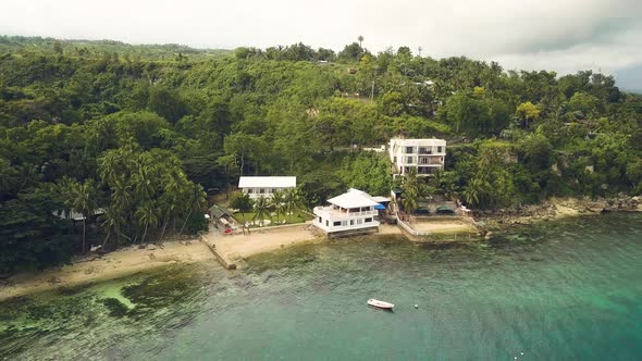 Aerial View Buildings on Tropical Island on Sea Beach. Resort Hotel on Sea Shore alt