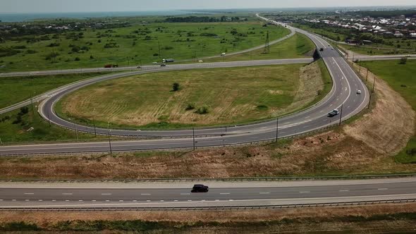  Aerial Fly Over Modern Highway Road Intersection on Rural Landscape alt