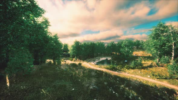 Heavy Rain Clouds Over the Field at the Sunset alt