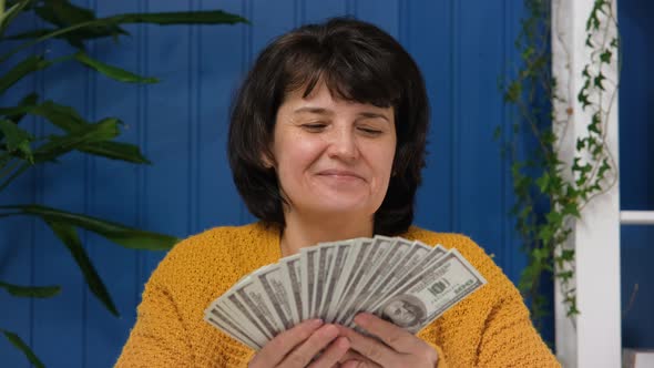 Middle Aged Woman Holding in Hands Money Cash Dollars