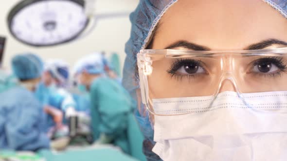 Young Female Surgeon in the Operation Room