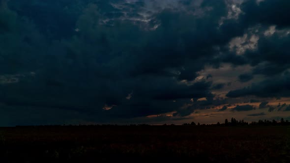 Sunset Over Wheat Field Timelapse. Vespers Sky